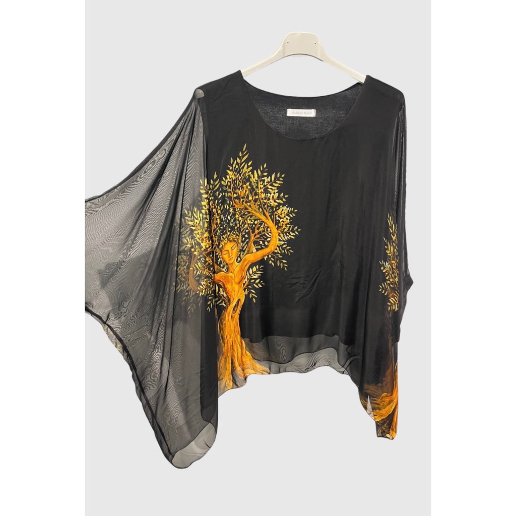 Blusa fluida con estampado artístico y mangas amplias