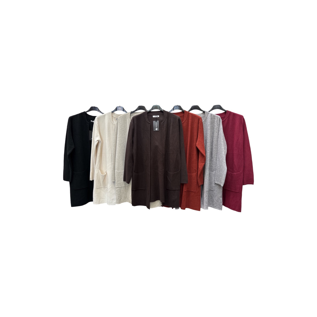 Cárdigans largos de punto con bolsillos en negro, fango, beige, choco, caldera, gris y granate.